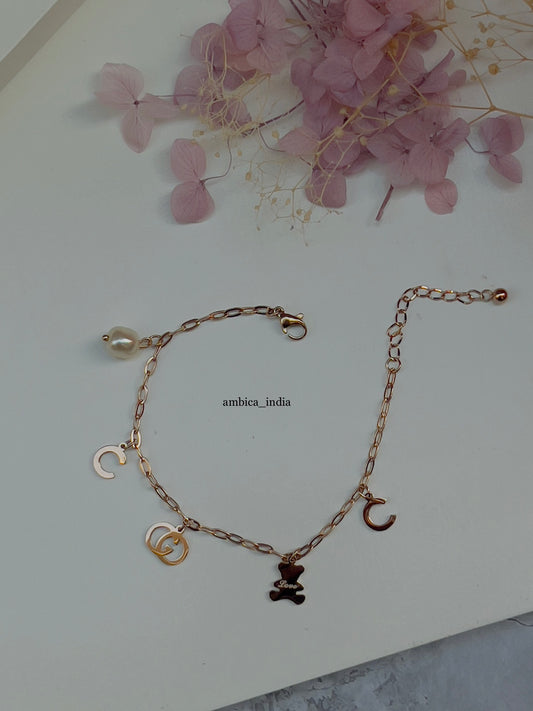 Pearl with charms bracelet