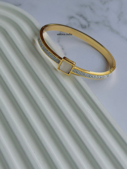 White square stone with studded bracelet