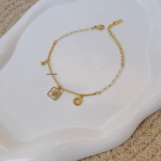 Sun with small pearl bracelet