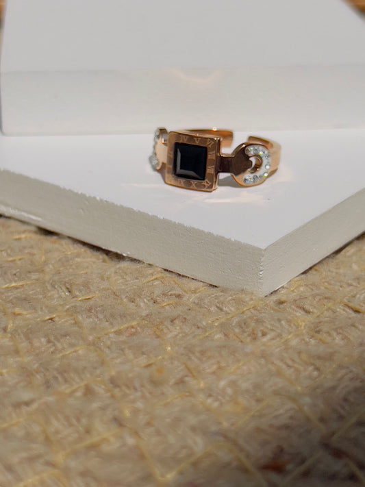 Black crystal with roman ring