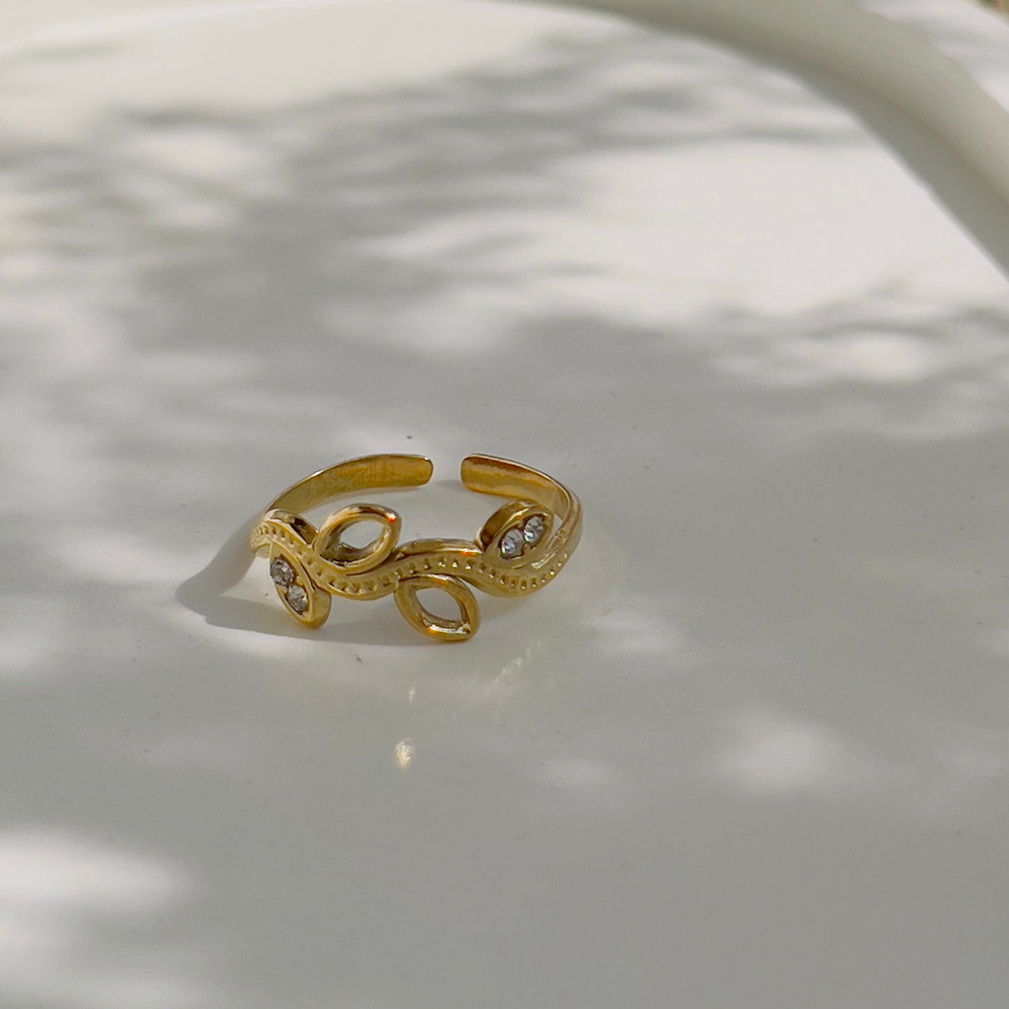 Leaf with crystal ring