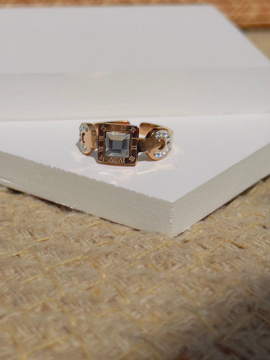 White crystal with roman ring
