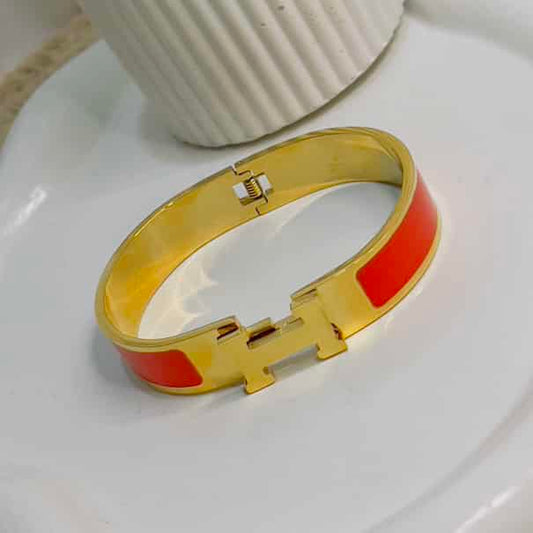 H orange bracelet