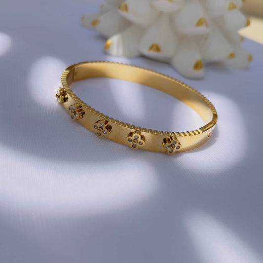 Studded clover bracelet