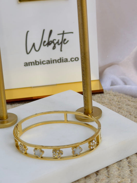 Flower with studded bracelet