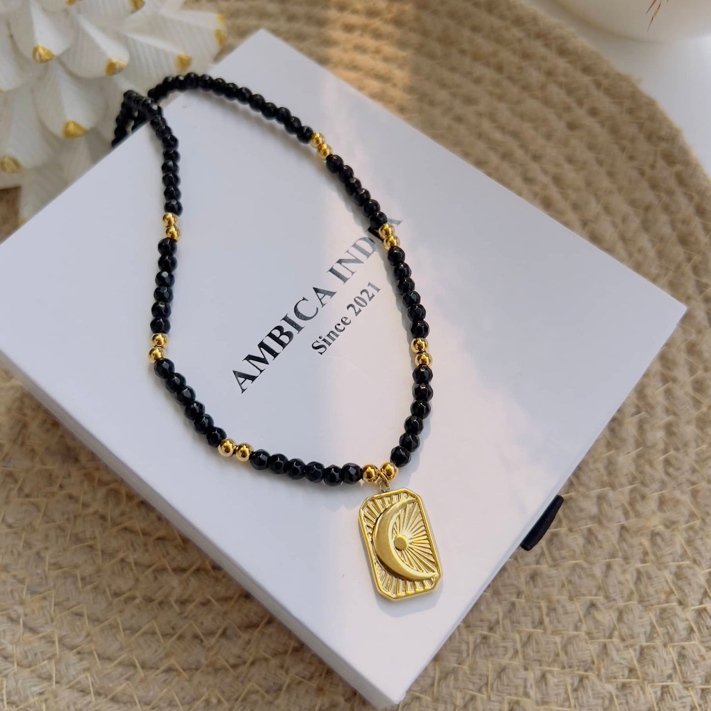 Black stone with moon star necklace