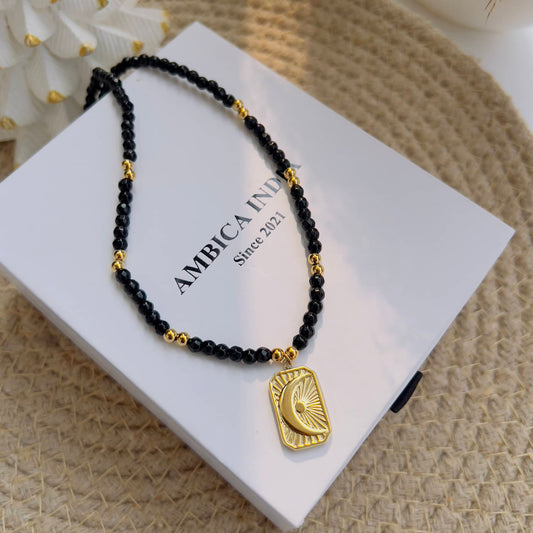 Black stone with moon star necklace