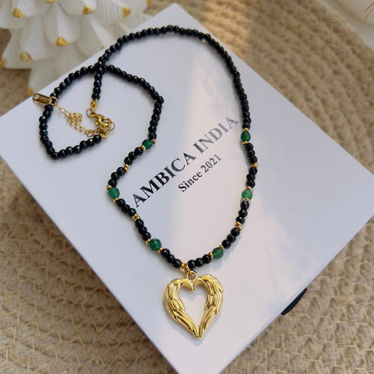 Black stone with green necklace