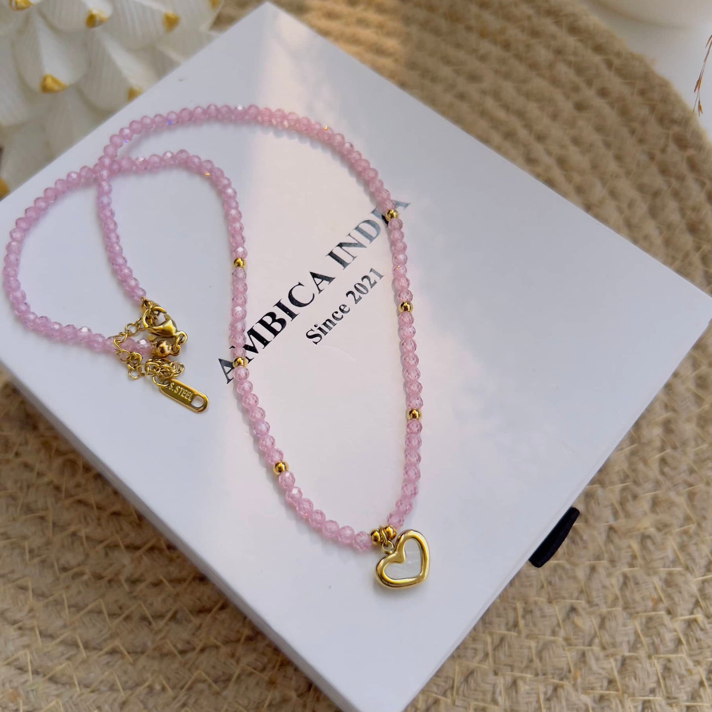 Pink stone with white heart necklace