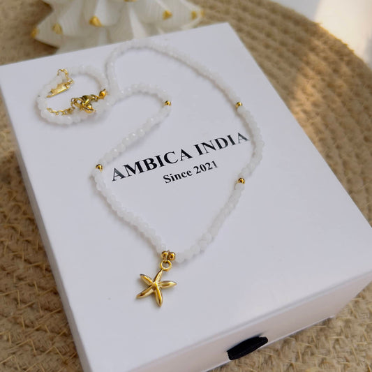 Star with white stone necklace