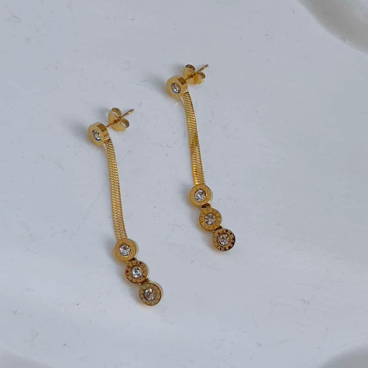 Roman with snake chain earrings
