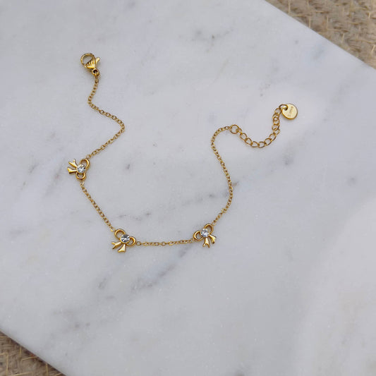 White bow minimal bracelet